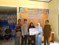 Personel Bhabinkamtibmas Desa Suka Mulia Monitoring dan Lakukan Pengamanan Penyaluran BLT-DD