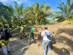 Satgas Pamtas Yonarmed 11 Kostrad Bersama Masyarakat Laksanakan Karya Bakti