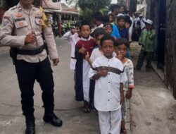 Aiptu H.Panjaitan Amankan Jum’at Berkah Di Tren Matika Jatibening Baru Kota Bekasi.