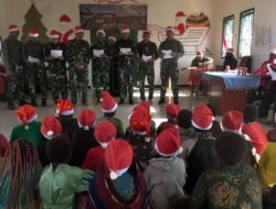 Prajurit Yonif 323 Kostrad Rayakan Natal Bersama Masyarakat Kampung Wako