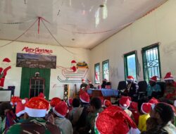 Prajurit Yonif 323 Kostrad Rayakan Natal Bersama Masyarakat Kampung Wako