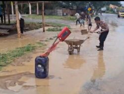 Sinergi Polisi dan Warga: Upaya Preventif Satlantas Polres Pidie Jaya Tangani Genangan Air