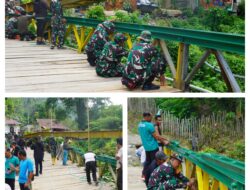 Satgas TMMD Kodim 1311/Morowali Bersama Warga Gotong Royong Mengecat Tiang Jembatan