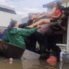 Trantib Kecamatan Ciledug Bantu Evakuasi Lansia Korban Terdampak Banjir di Puri Kartika Baru