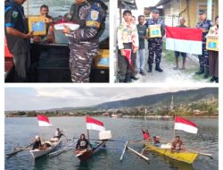 TNI AL Posal Luwuk menerjang ombak, membagikan Sembako dan Bendera Merah Putih