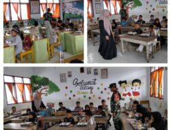 Sukseskan Makan Bergizi Gratis, Babinsa 09/Langgam Dampingi Pendistribusian Makan Bergizi ke Sekolah