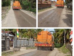 Satgas TMMD Lakukan Penyiraman Jalan Guna Perkuat Material Timbunan